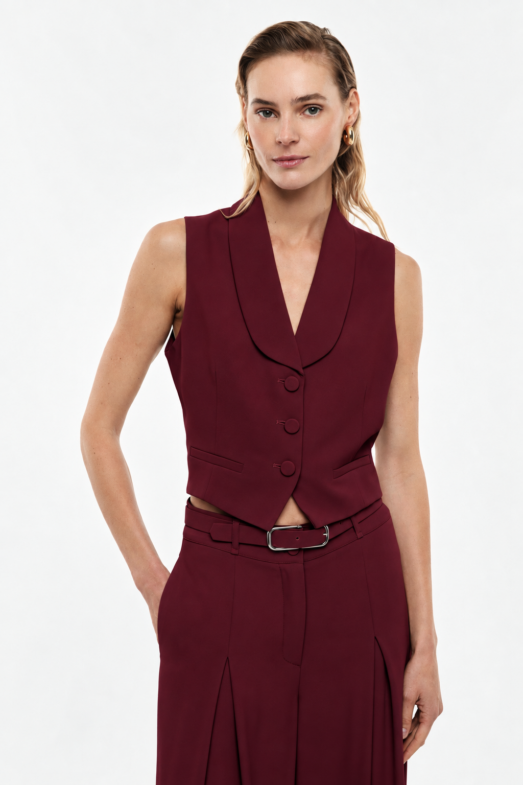 Vest with lapels and covered buttons